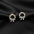 Rose Gold Pearl Bow Stud Earrings