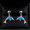 Silver Ocean Glow Dolphin Drop Earrings